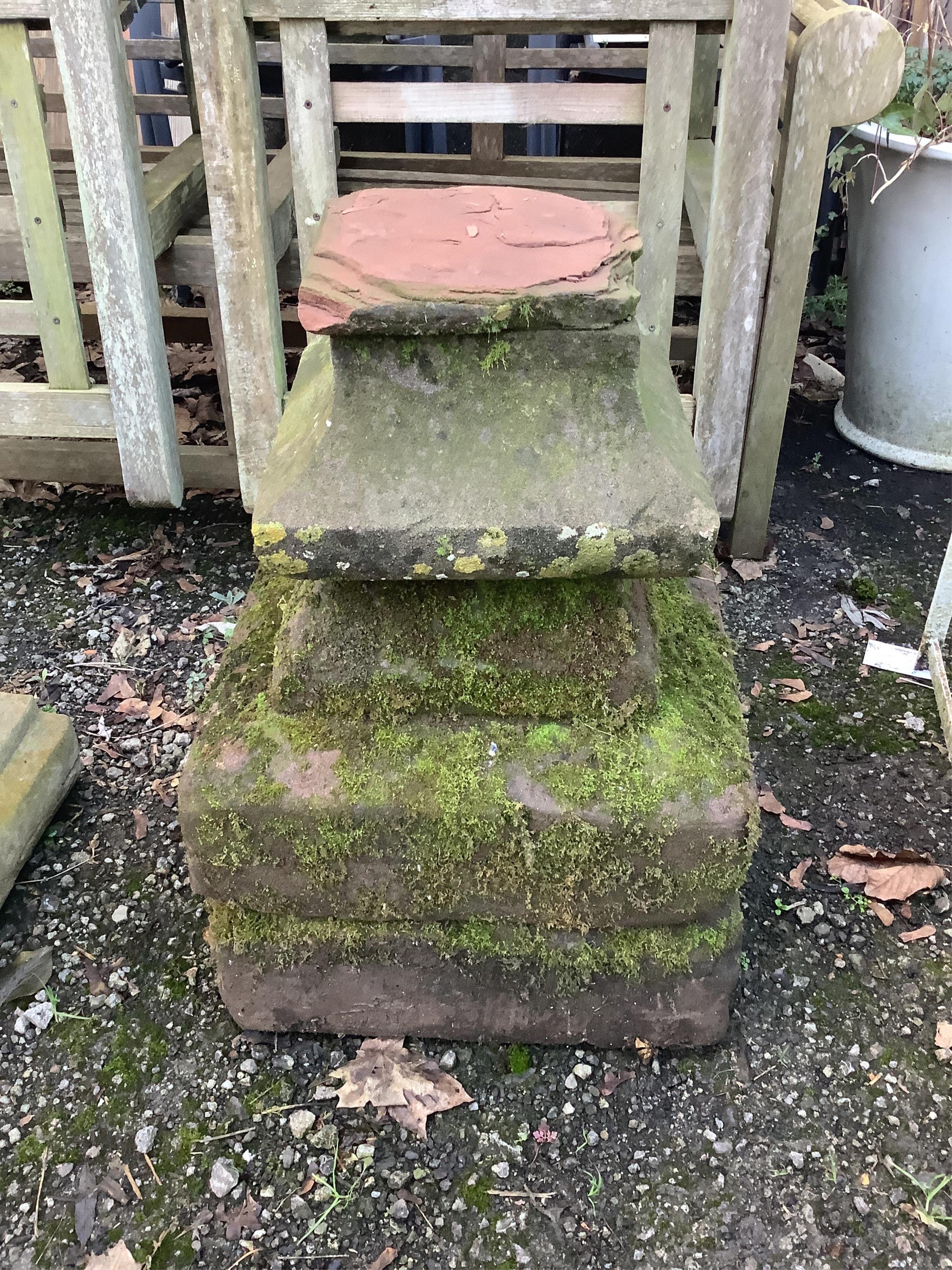 Three natural stone stepped square shaped garden plinths, larger 43cm, height 16cm. Condition - poor to fair